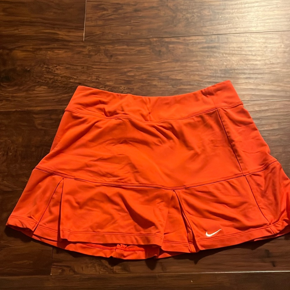 Nike Dri-Fit tennis skort in orange